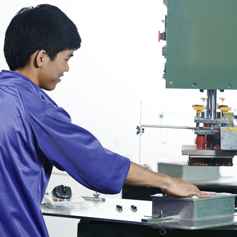 Skilled Worker Using Machine for Production